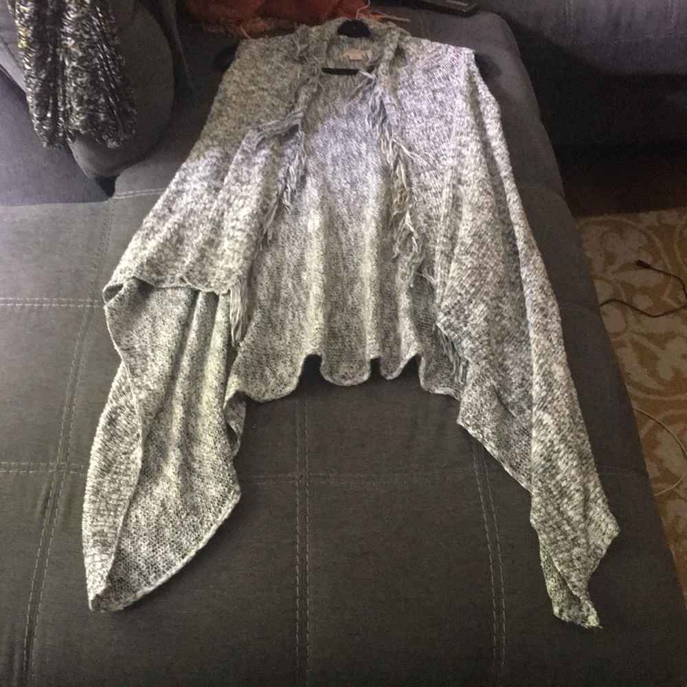 Black, and white. 61% cotton, 39% acrylic
